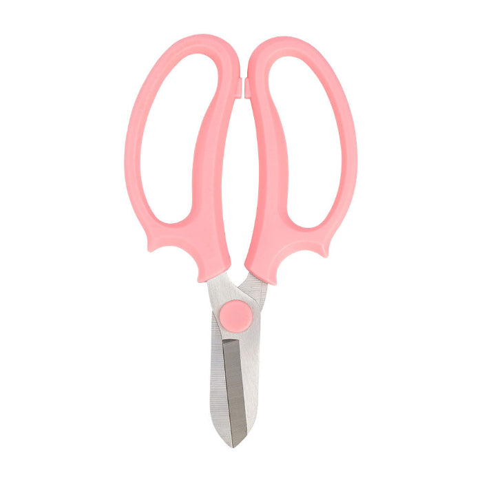 PINK FLOWER SCISSORS ON WHITE BACKGROUND