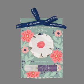 Ceramic dish with floral design packaging on a white background