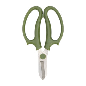 Green kitchen shears on a white background