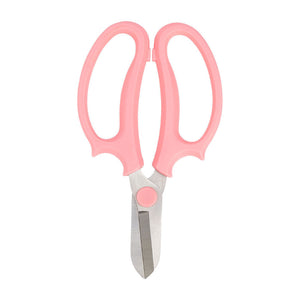 PINK FLOWER SCISSORS ON WHITE BACKGROUND