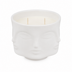 White textured candle jar with wavy design on a white background