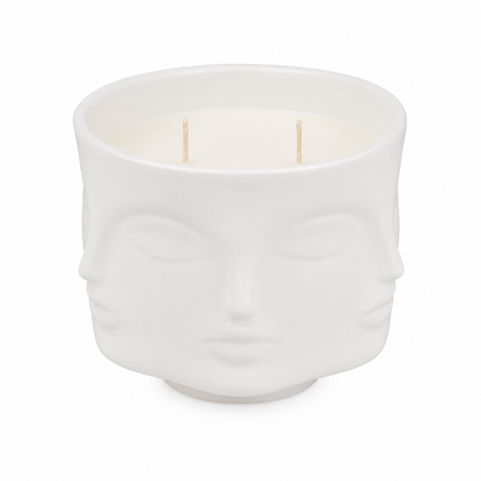 White textured candle jar with wavy design on a white background