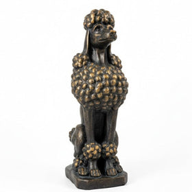 Statue of a poodle with a textured body on a white background