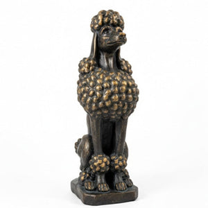 Statue of a poodle with a textured body on a white background