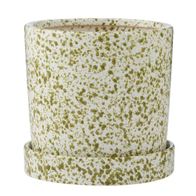 Speckled green and white ceramic planter on a white background
