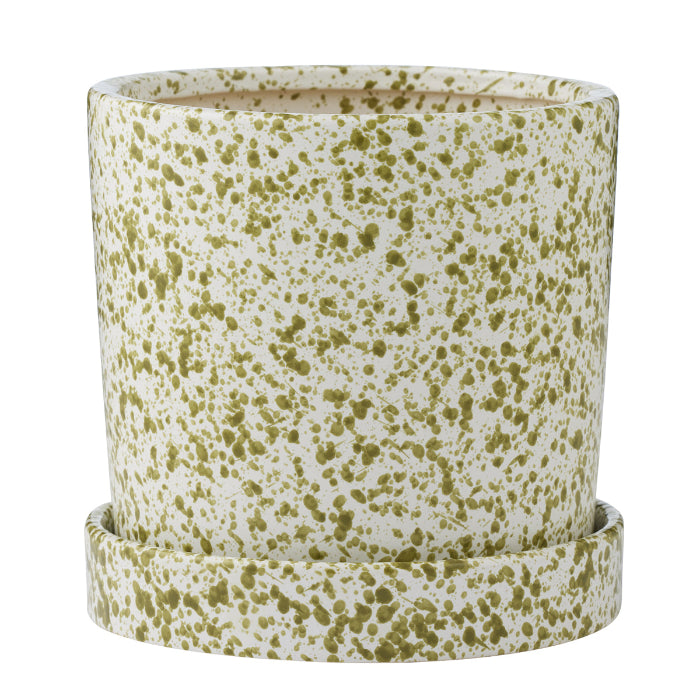 Speckled green and white ceramic planter on a white background