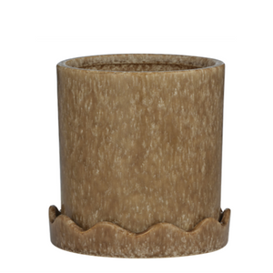 Brown ceramic planter with scalloped edge on a white background
