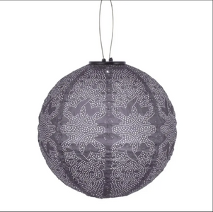 Decorative spherical lantern with intricate patterns on a white background