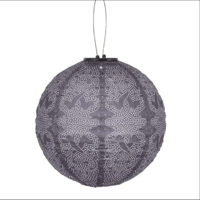 Decorative spherical lantern with intricate patterns on a white background
