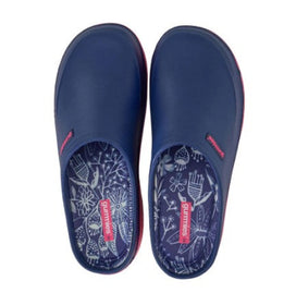 Pair of navy blue clogs with floral patterns on a white background
