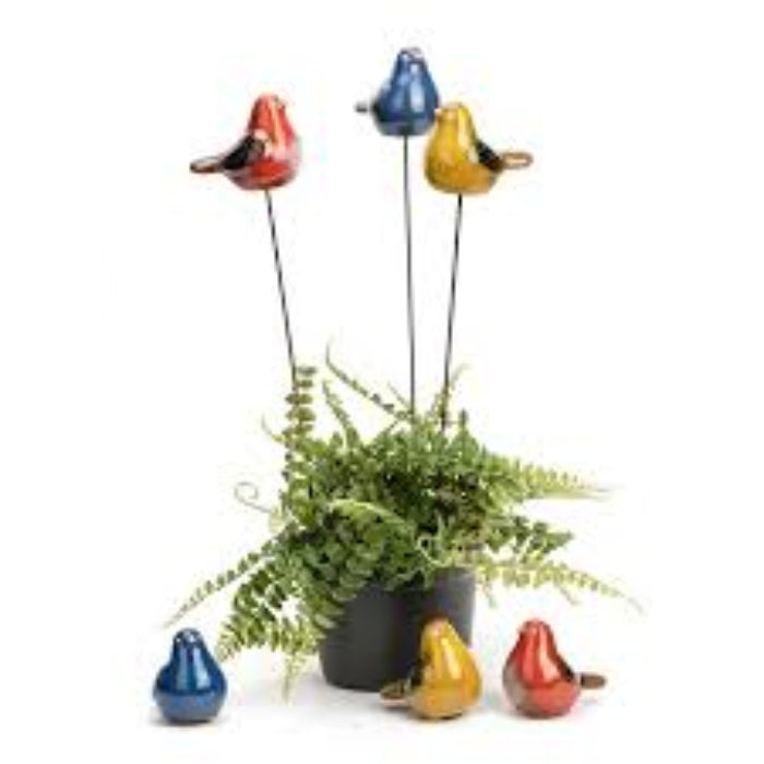 ceramic birds on stakes