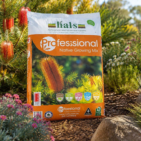 bag of native potting mix in a garden setting