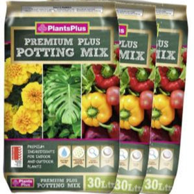 Three packages of PlantsPlus Premium Plus Potting Mix with images of plants and vegetables on the packaging.