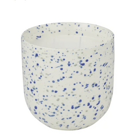 Speckled ceramic cup with blue and gray specks on a white background