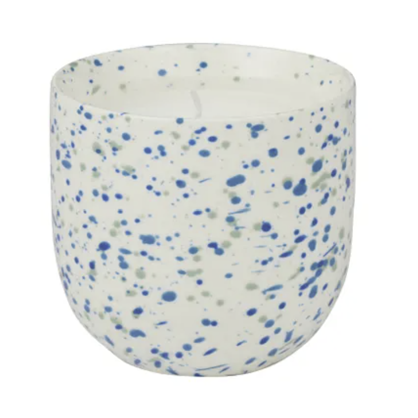 Speckled ceramic pot with blue and gray specks on a white background