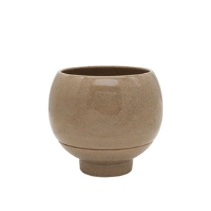 Brown ceramic pot on a white background