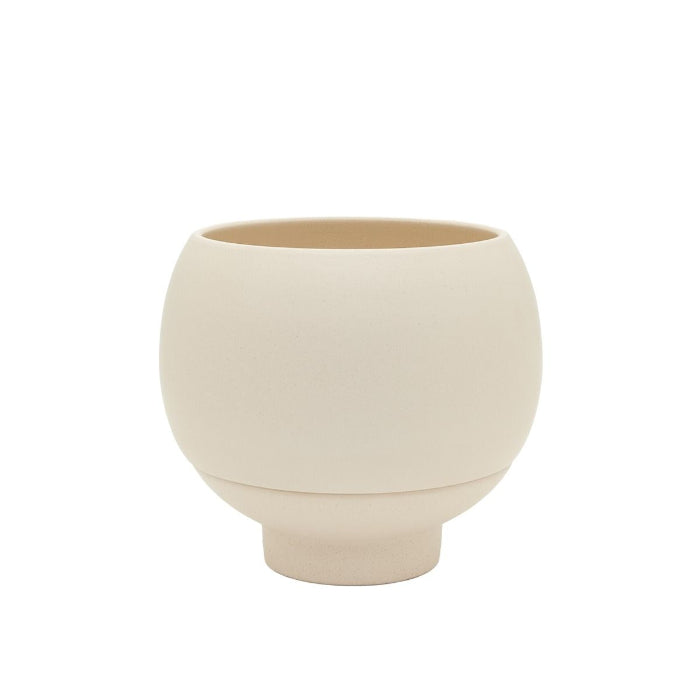 Beige ceramic planter on a white background