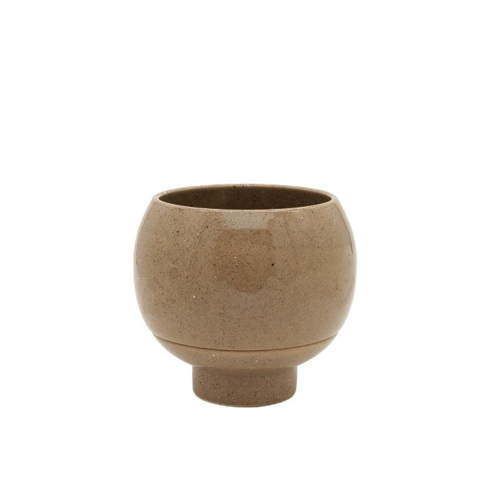 Brown ceramic cup on a white background