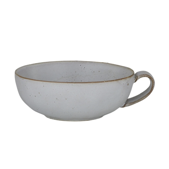 A speckled ceramic cup with a light gray body, brown speckles, and a thin brown rim, featuring a curved handle on a plain white background.