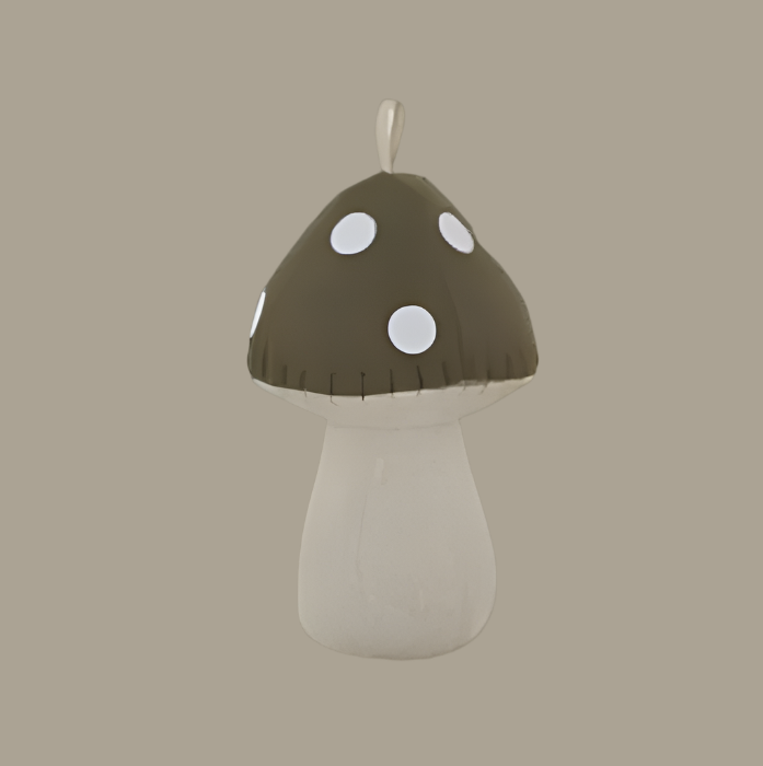 Mushroom-shaped plush toy with a brown cap and white spots on a white background