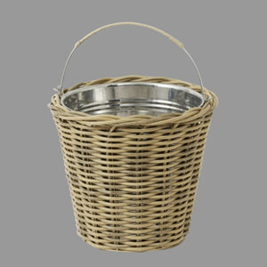 Wicker basket with metal liner on a white background