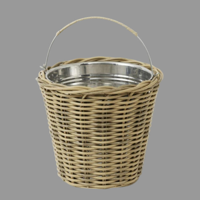 Wicker basket with metal liner on a white background